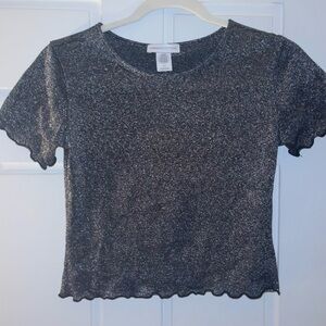 Sheer, silver, shimmery Women’s Urban Outfitters top. Size: Small.